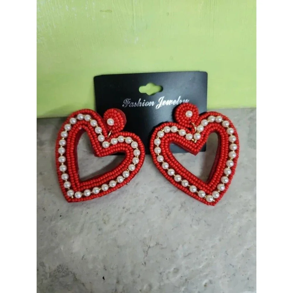 Love and  kisses red heart with pearl accent